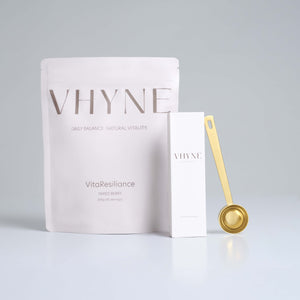 A pouch of VitaResiliance by Vhyne with the gold perfect measure scoop and box